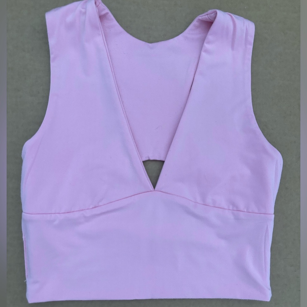 Light pink tank with cutouts